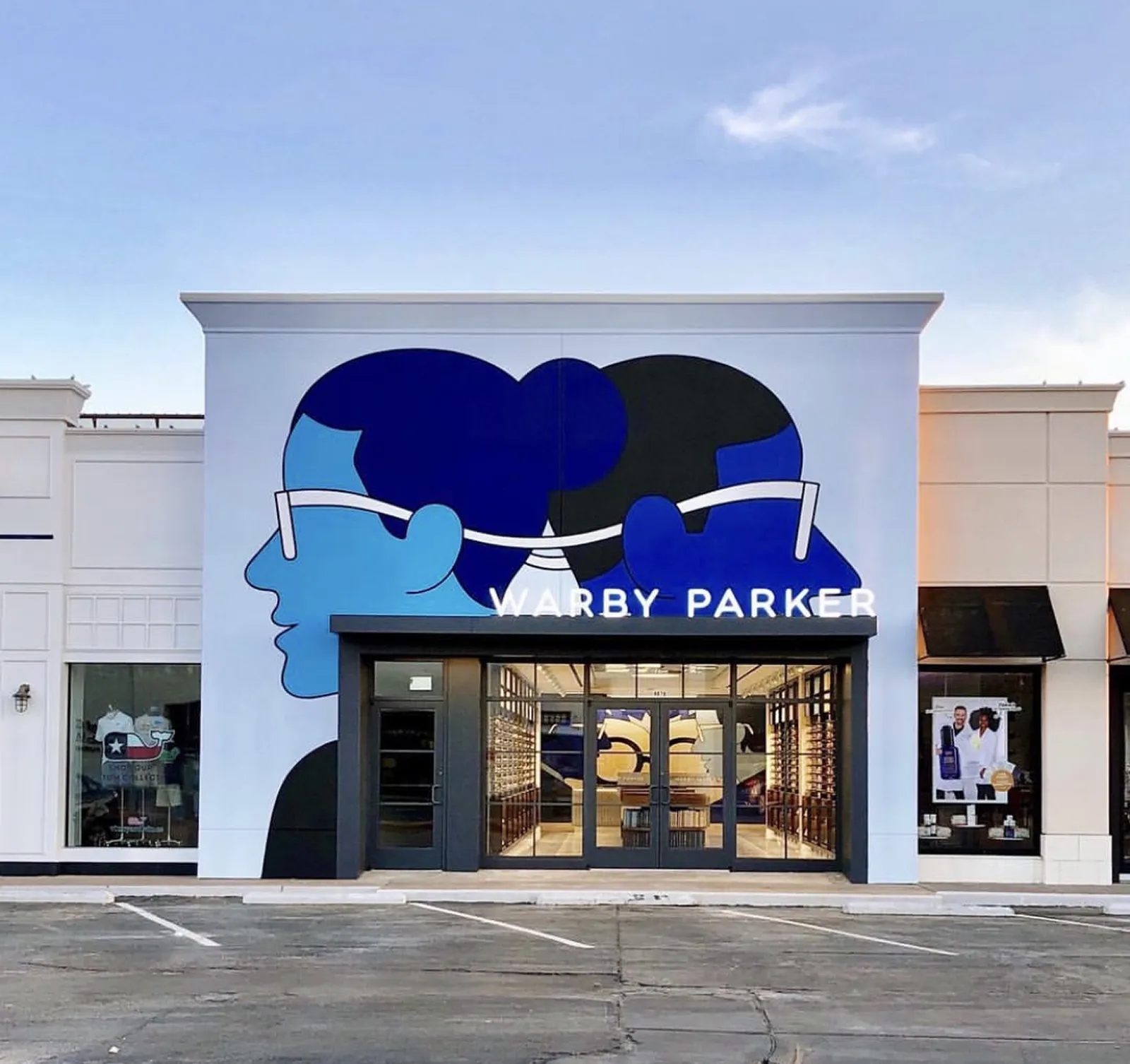 storefront exterior mural - hand painted on stucco - Houston Texas