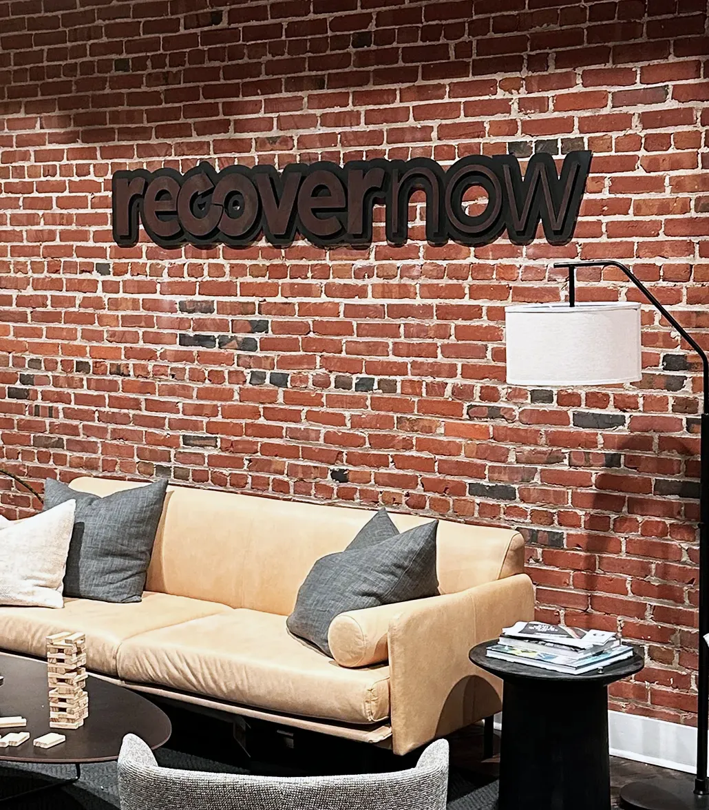 fabricated sign - logo sign installed in office space - Birmingham Alabama - 2nd Ave. N - metal patina