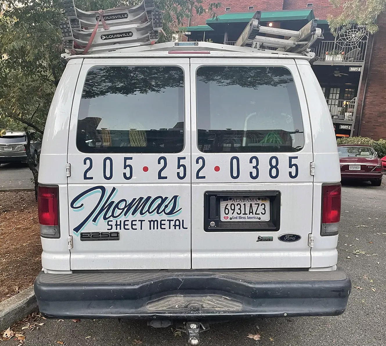 vehicle lettering - custom script lettering - Birmingham Alabama - hand painted - back view